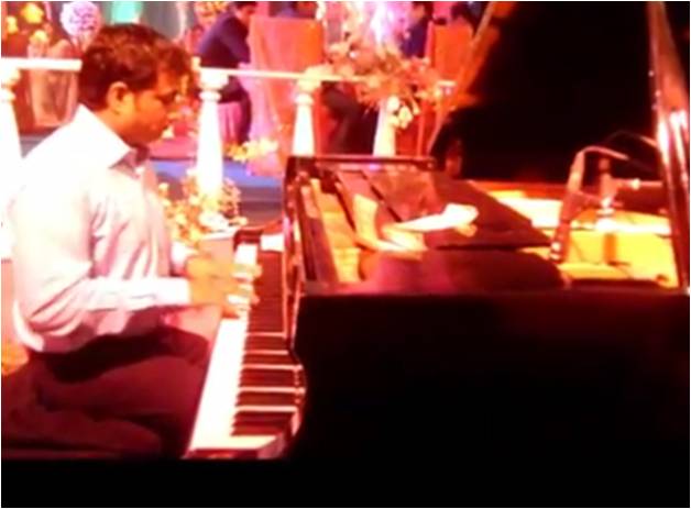 male piano player gujarat